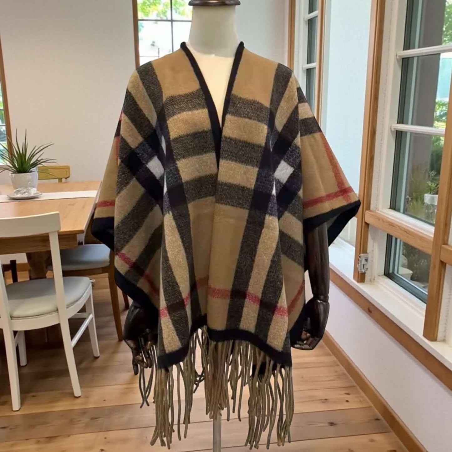 Heritage Plaid Luxe Poncho Shawl – One Size Cozy Fringe Wrap on display, showcasing a timeless plaid design and fringe hem.