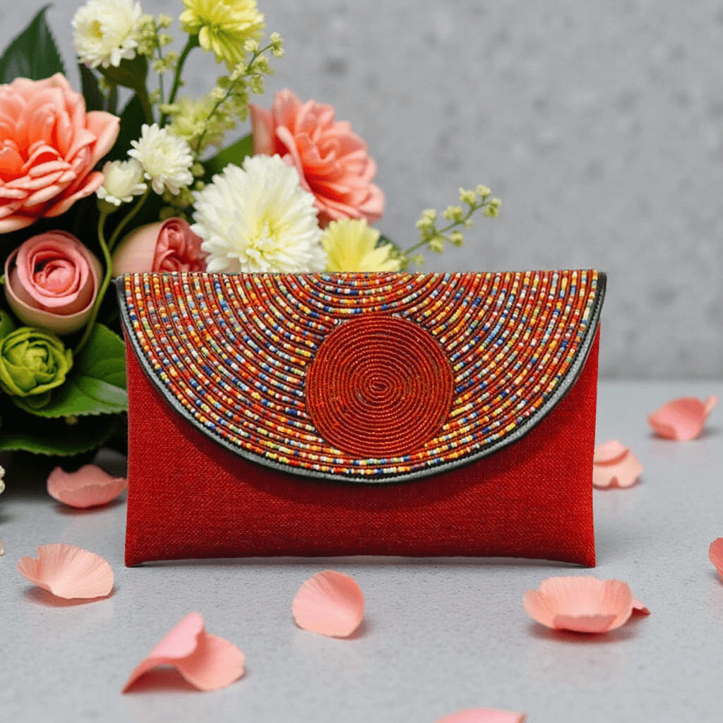 Bea Beaded Clutch/ Shoulder Bag with vibrant circular beadwork design on red base, perfect for special occasions.