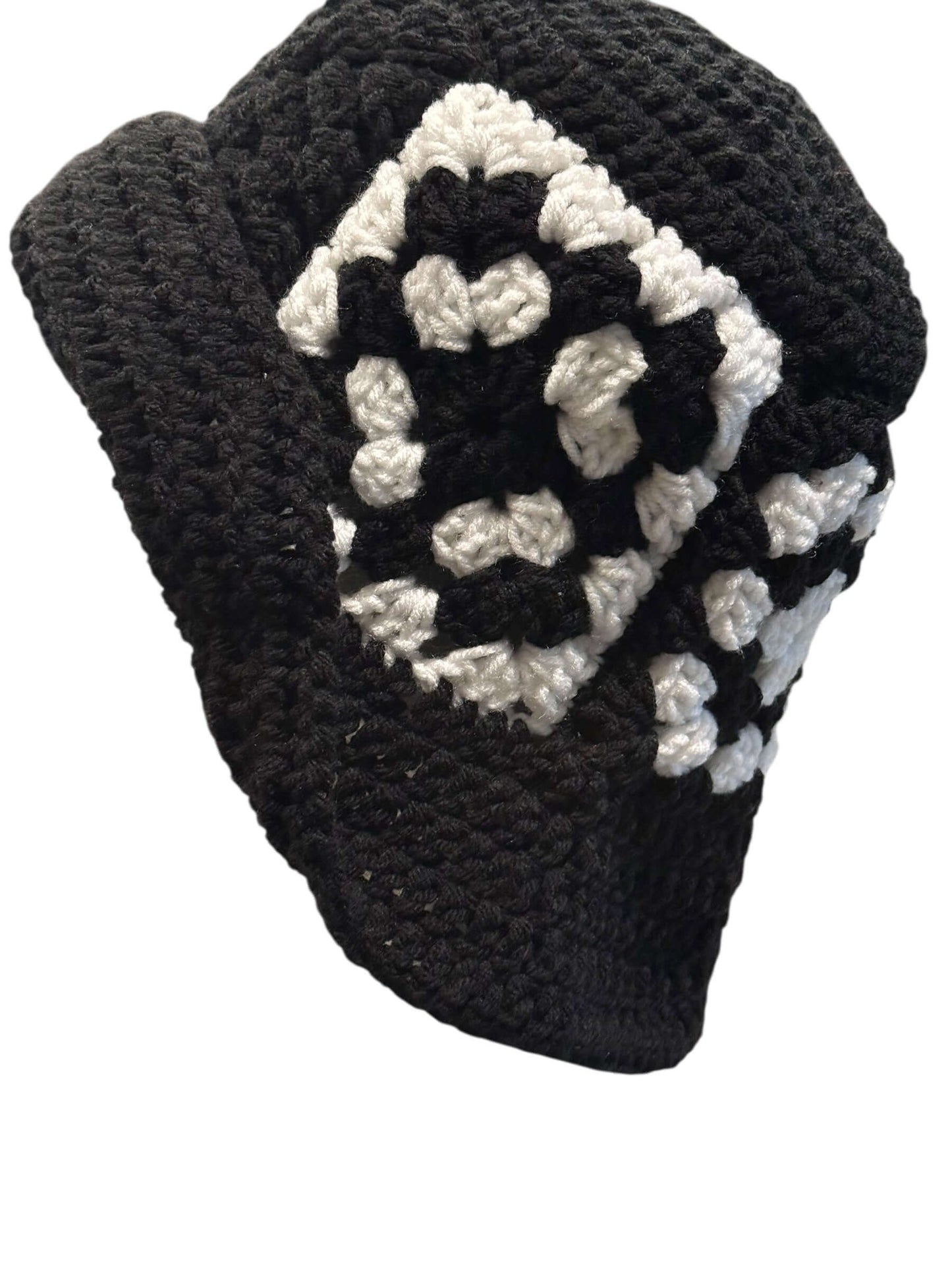 Midnight Mosaic Crochet Hat & Statement Earring Set featuring a handcrafted black and white crochet hat.