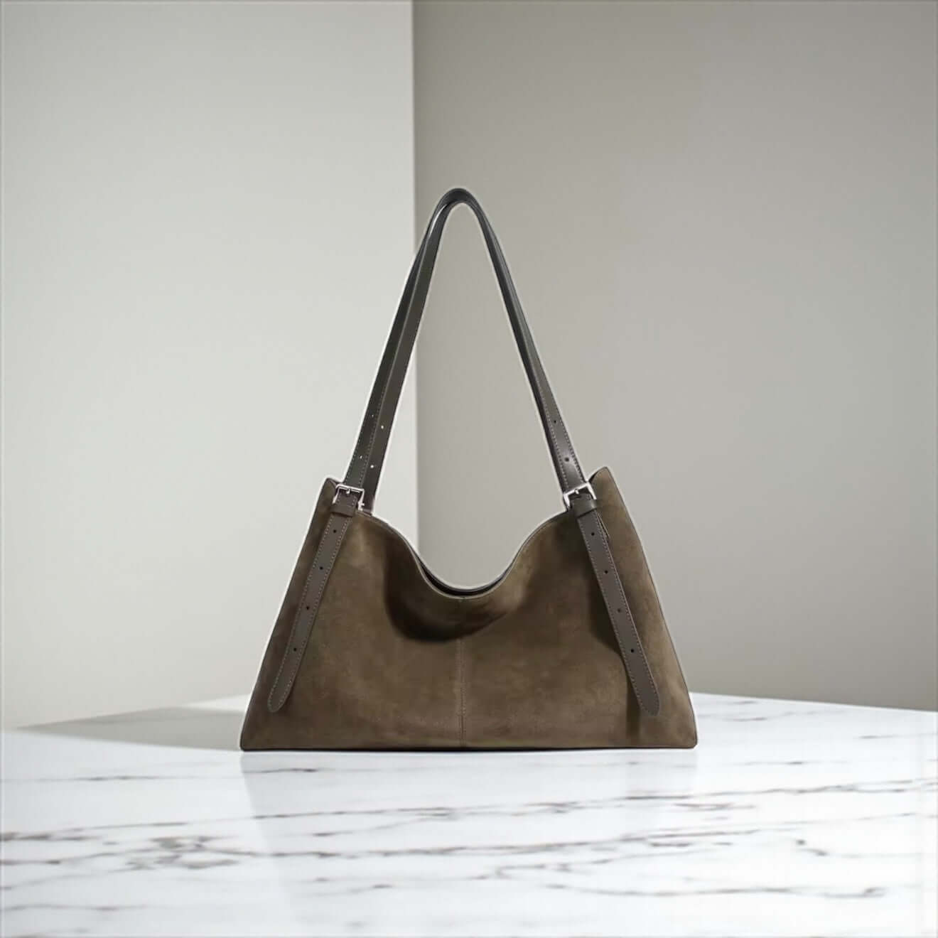 Autumn Luxe Crossbody – Suede & Leather Fall Handbag | Legacy Dealz displayed on a marble surface.