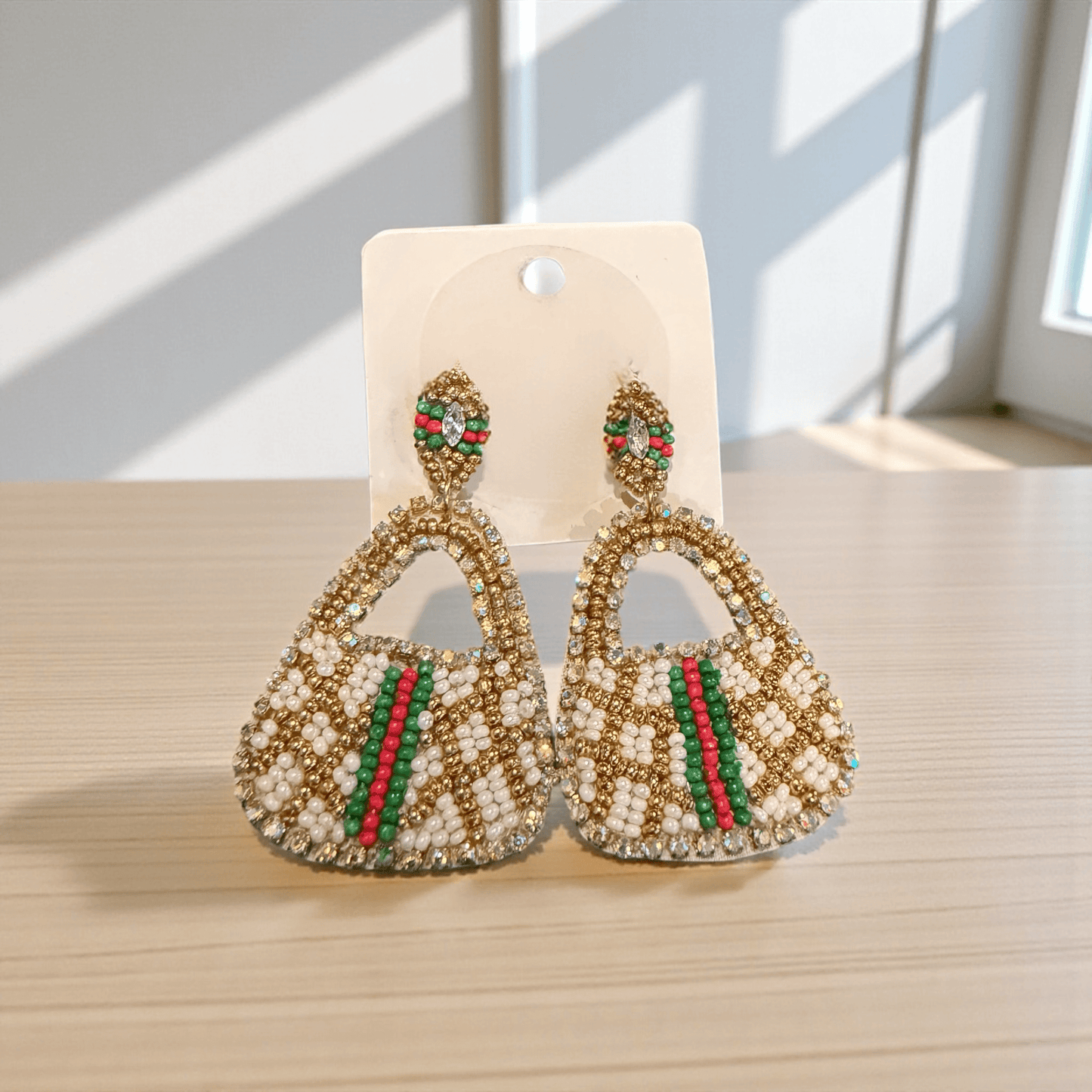 Mini Luxe Handbag Statement Earrings | Beaded Designer Style displayed on a surface with natural light.