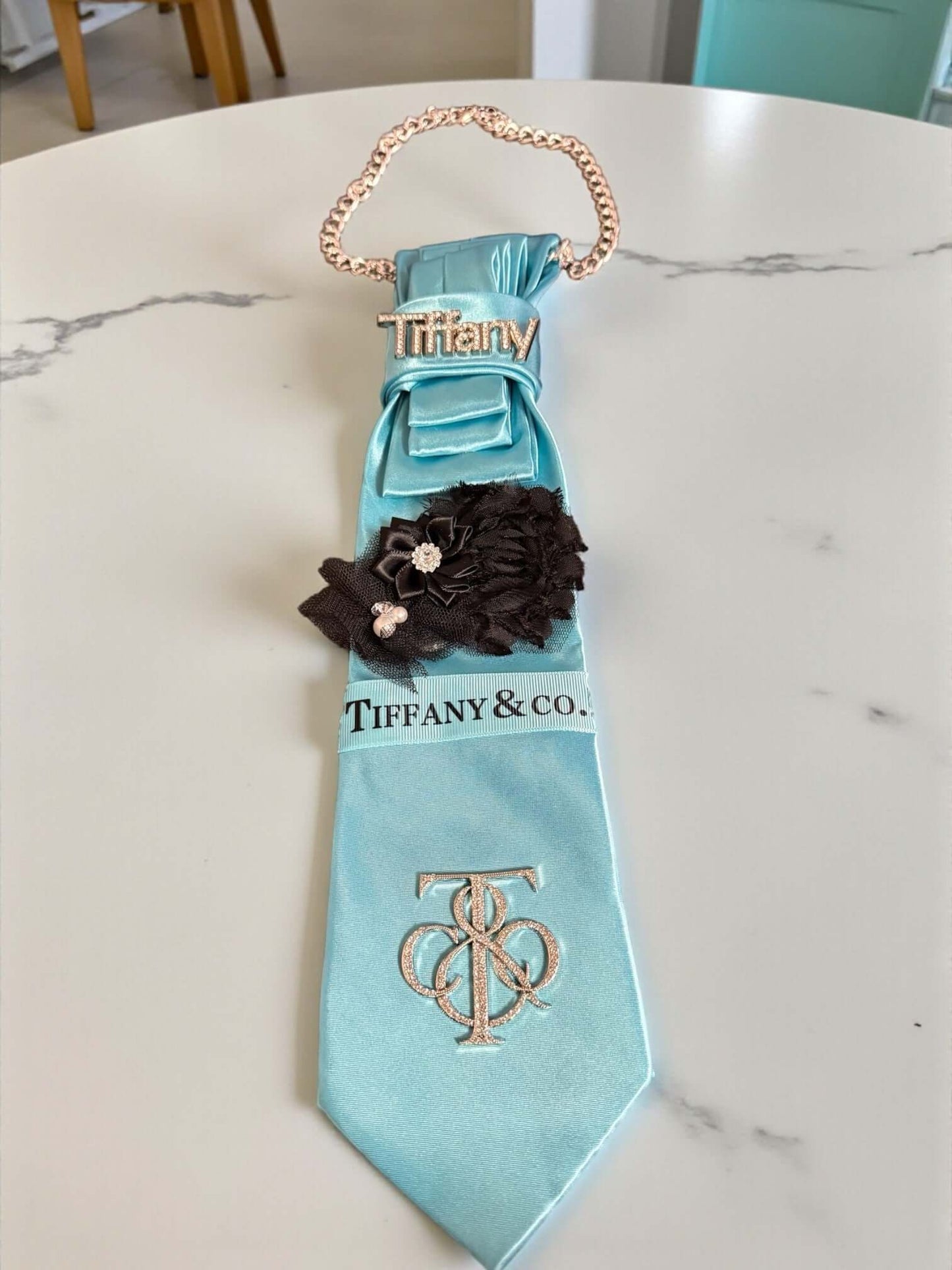 Blue Luxe Signature Tie – Handcrafted Satin Couture Accessory | Legacy Dealz displayed on a marble surface.