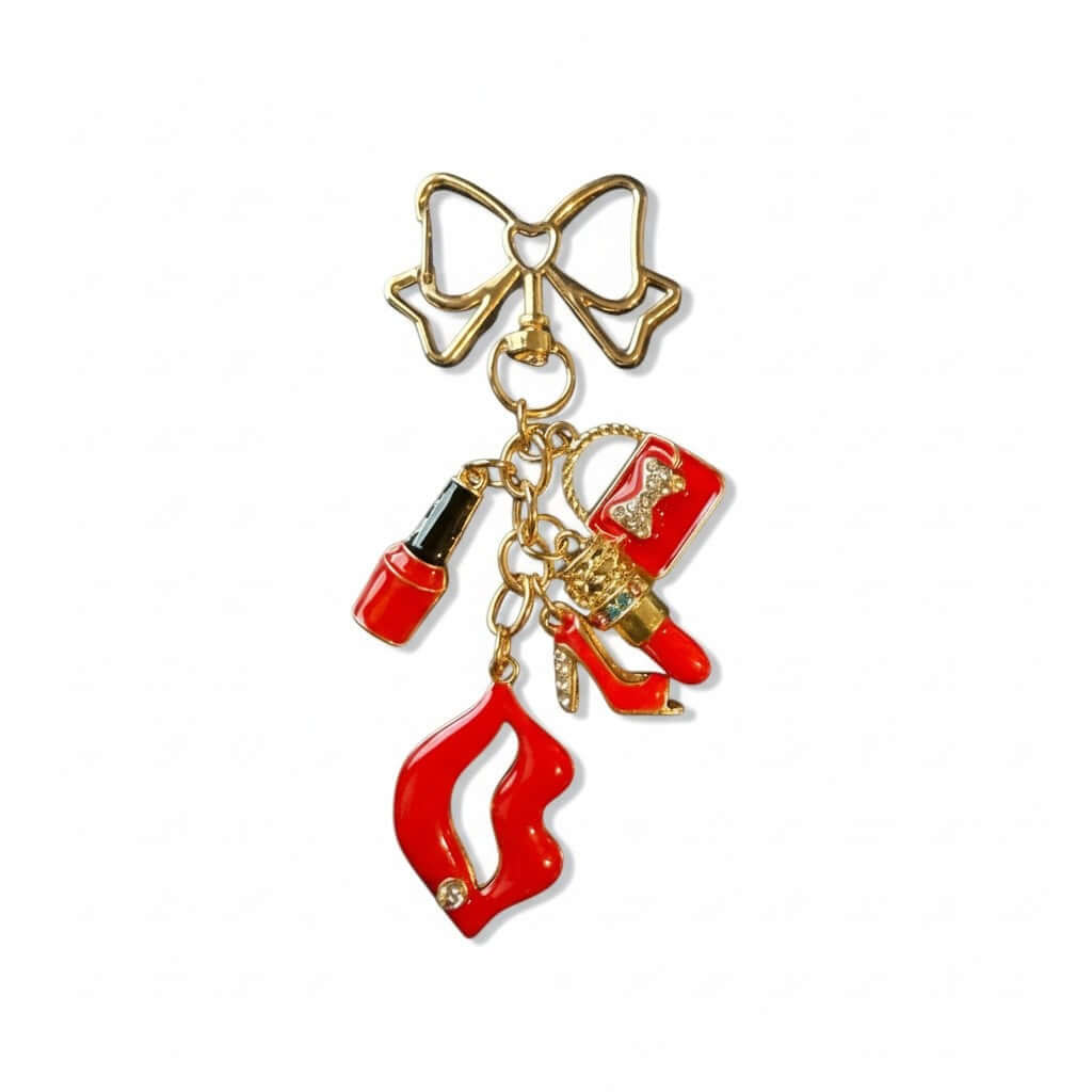 Legacy Red Glam Bow Charm featuring red enamel lips, mini purse, nail polish, glam stiletto, and gold bow clip.