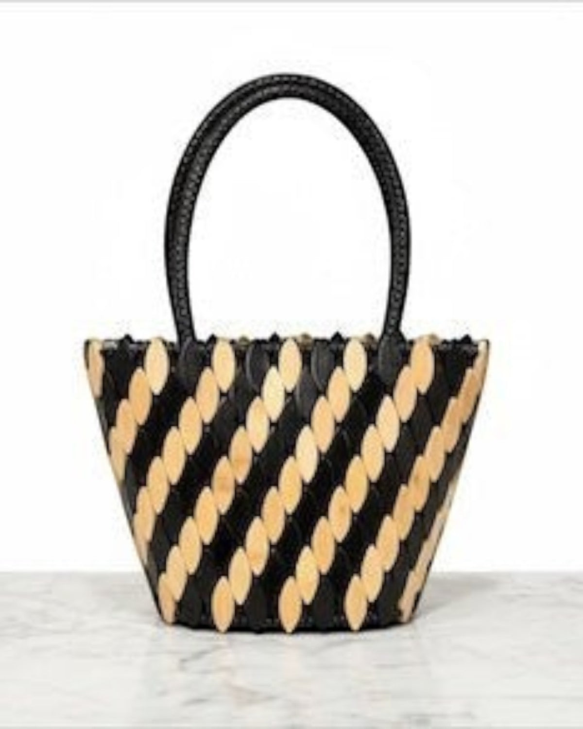 Legacy Dealz Annie handcrafted tote bag in black and cream leather with wood appliqué. Bucket style with top handles.