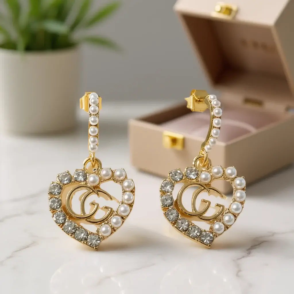Golden Legacy Pearl Crest Earrings (Upcycled | One-of-One Statement Pair) displayed elegantly.