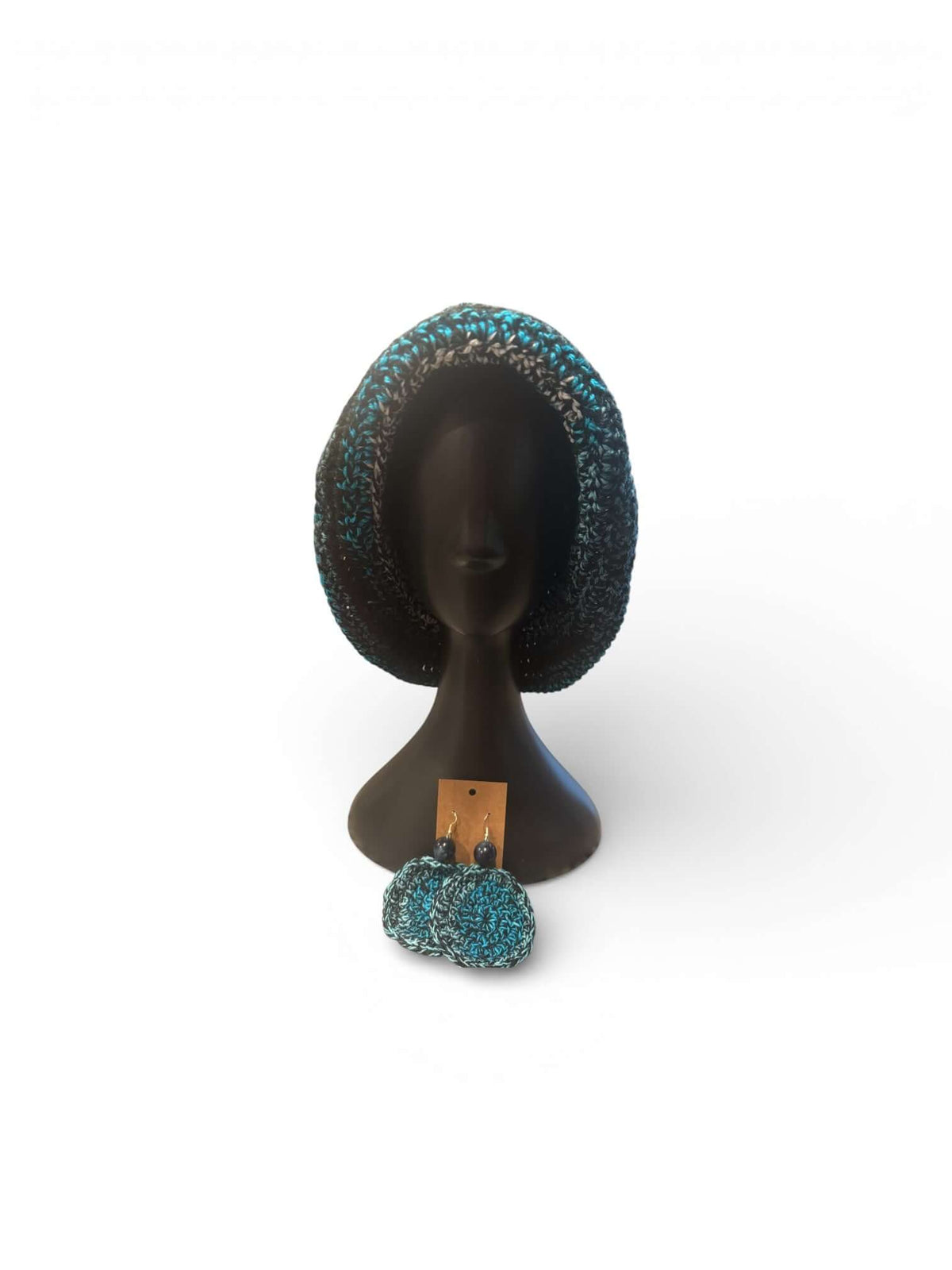 Signature Texture Crown Set – Artisan Statement Accessory showcasing a handcrafted crochet bucket hat and coordinating earrings.