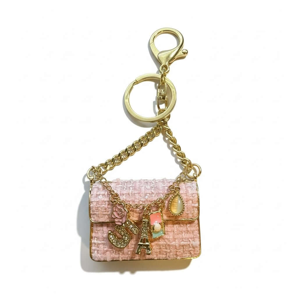 Legacy Parisian Charm Mini luxury tweed-style mini bag charm with charms and gold chain details.
