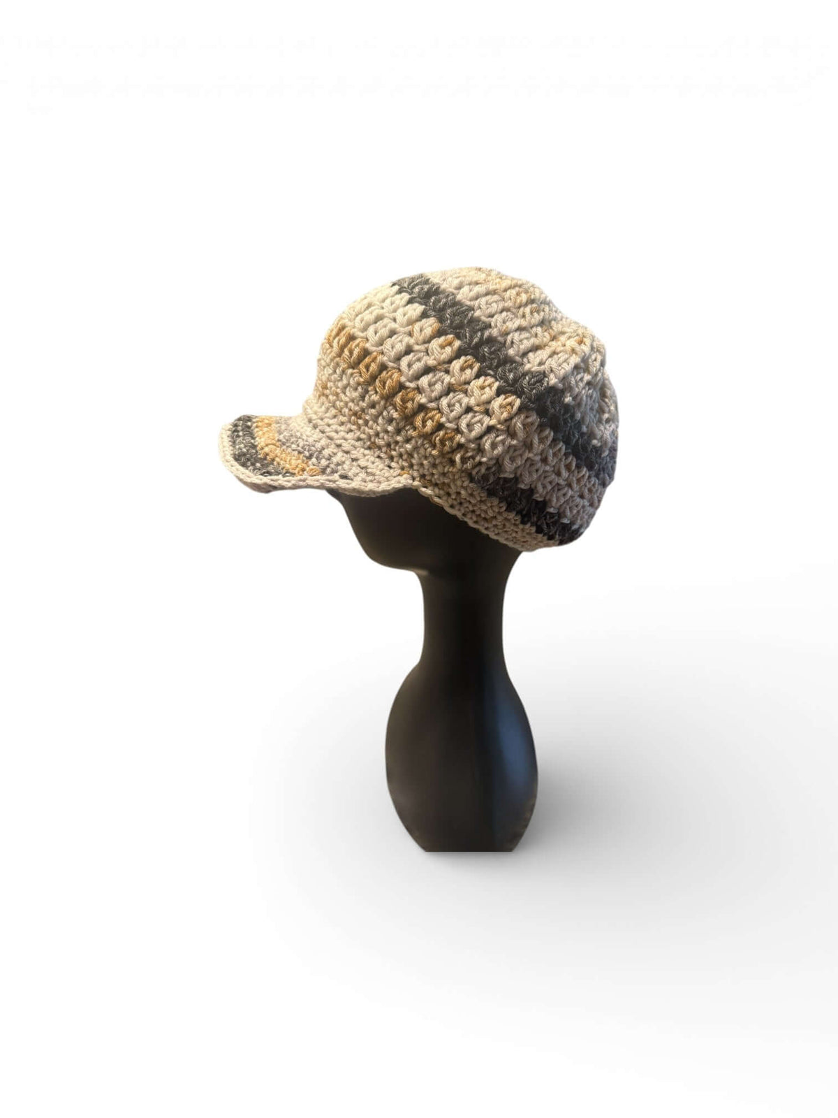 Signature Texture Crown Set -Heritage Loop - Handmade Artisan Style crochet newsboy cap shown from the side on a mannequin.