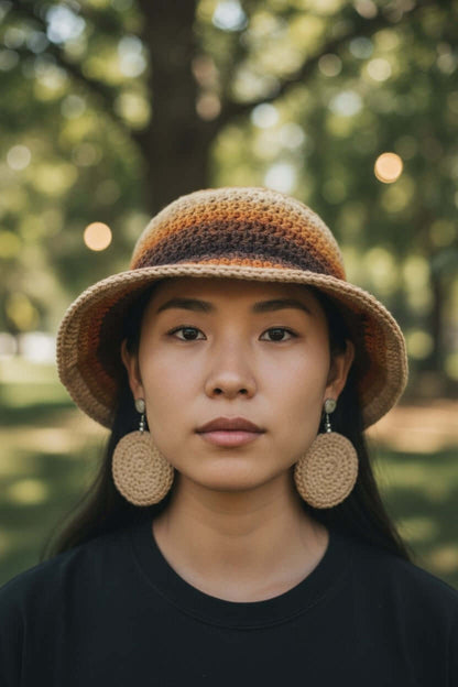 Signature Texture Crown Set- Earthtone Harmony – Handmade model wearing handmade crochet bucket hat and earrings.