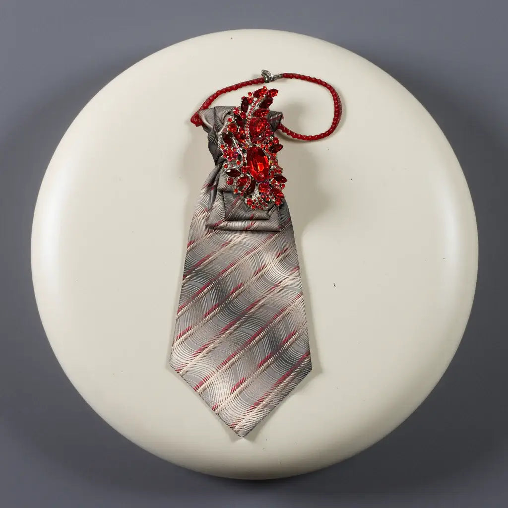 Scarlet Stone Tie Handcrafted Legacy Luxe Tie featuring a textured design and bold scarlet stone centerpiece.