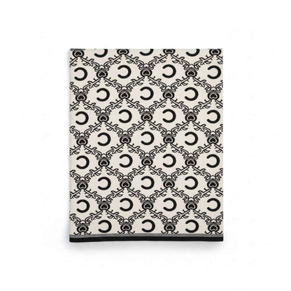 Royal Heritage Emblem Wrap featuring a luxurious heritage-inspired emblem pattern on a soft fabric.
