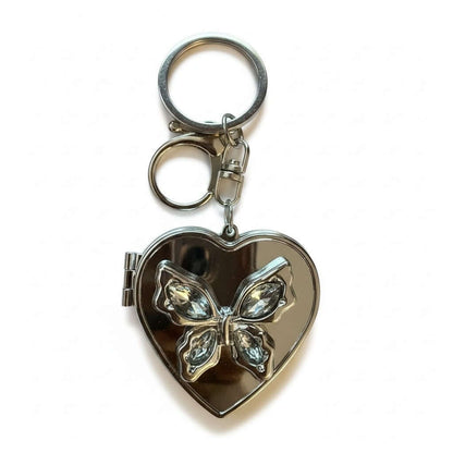 Legacy Blush Butterfly Locket Charm with heart shape and butterfly design, perfect for key rings and handbags.