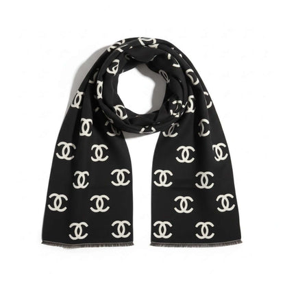 Chic black scarf with emblem pattern, showcasing luxurious style and sophistication.