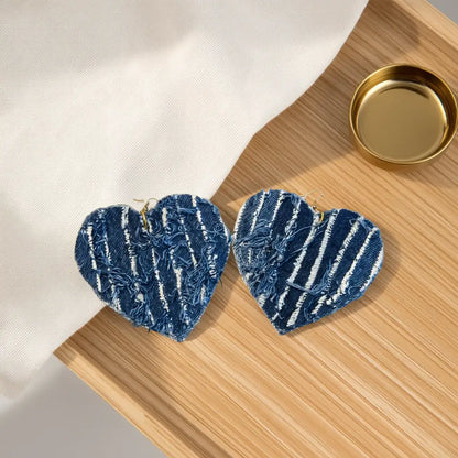 Blue Jean Soul – Handcrafted Heart Earrings made from reclaimed denim with unique fray and texture.
