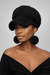 Blackstone Crochet Crown Set- One of One-Signature Texture showcased on a model wearing a knit cap and earrings.