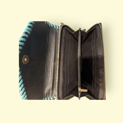 Interior view of the Bloom Cowhide Crossbody Wallet showing zipper and compartments.