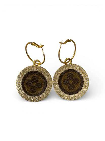 One-of-One Gold Halo Statement Earrings with textured center and dazzling crystal halo.