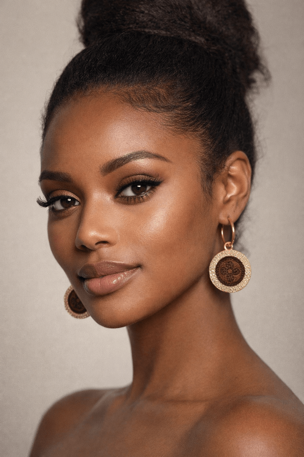 One-of-One Gold Halo Statement Earrings worn by a model showcasing its unique design and craftsmanship.