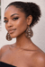 Model wearing Heritage Halo Teardrop Earrings showcasing their elegant design and sparkling crystal details.