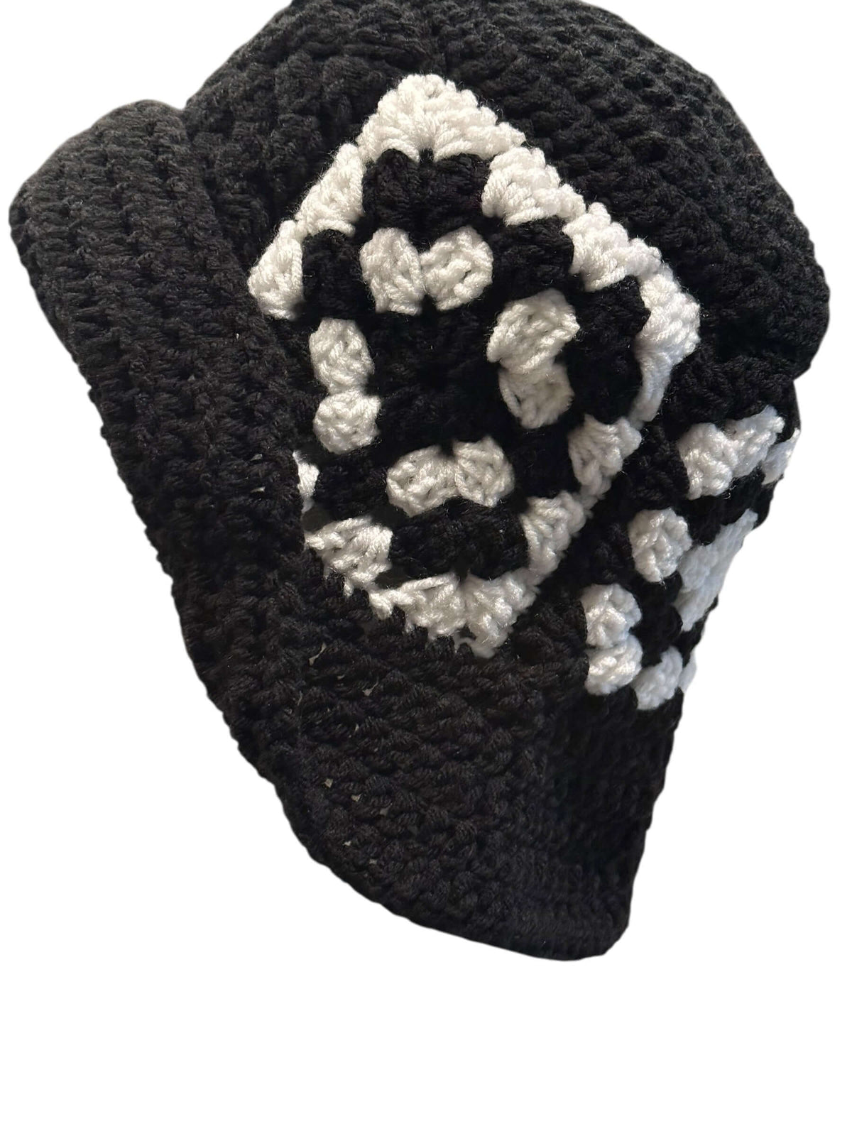 Midnight Mosaic Crochet Hat & Statement Earring Set featuring a handcrafted black and white crochet hat.