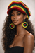Rasta Rhythm Crochet Newsboy Cap & Statement Earring Set worn by model, featuring vibrant crochet design and colorful earrings.