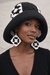 Midnight Mosaic Crochet Hat & Statement Earring Set worn by a model showcasing the unique design and texture.