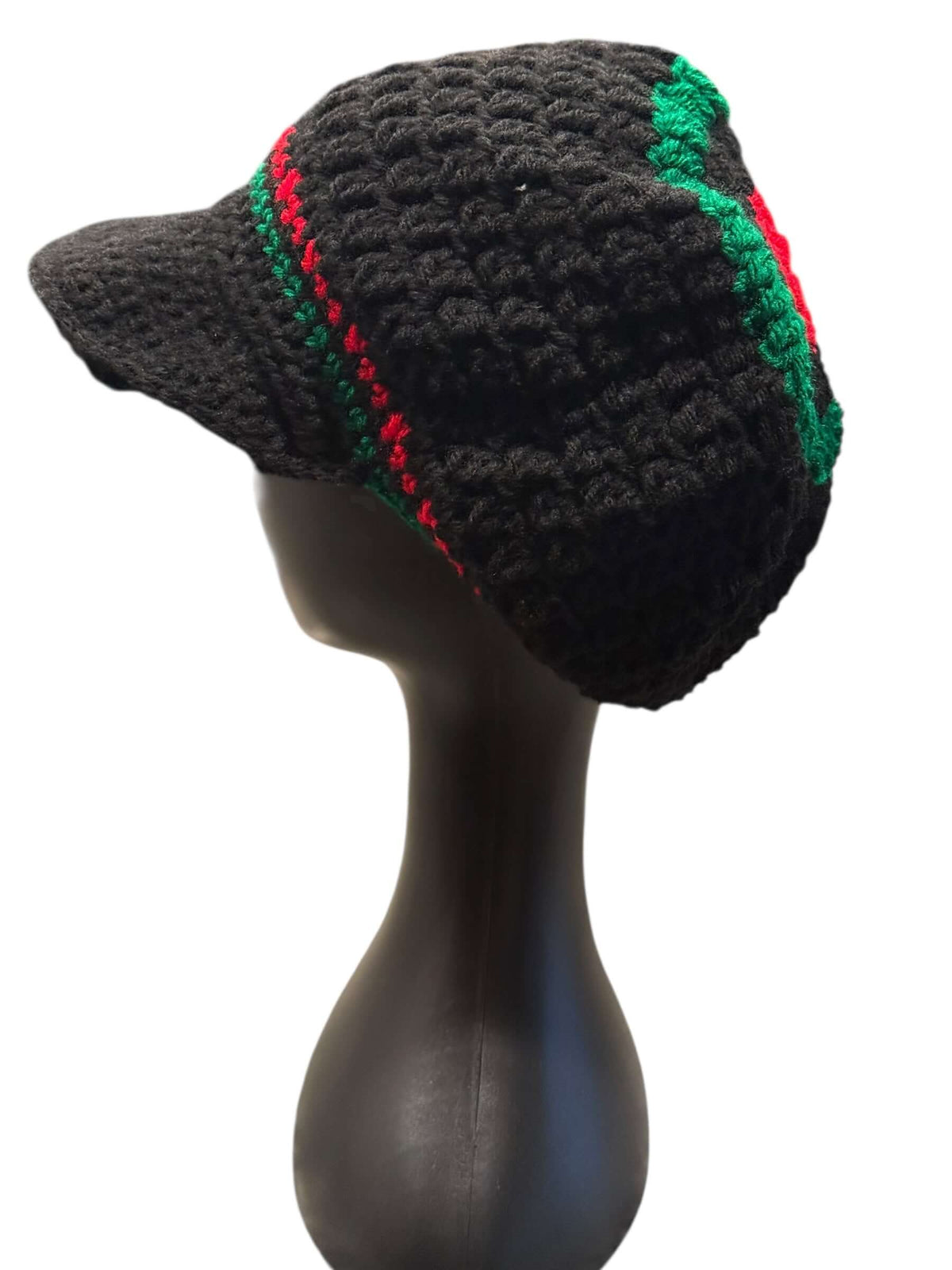 Rooted Rhythm Crochet Crown Set-Signature Texture Crown Set side view of handcrafted black crochet cap with red and green accents.