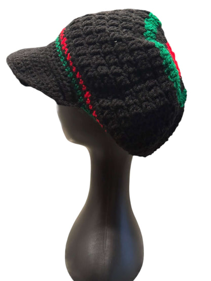 Rooted Rhythm Crochet Crown Set-Signature Texture Crown Set side view of handcrafted black crochet cap with red and green accents.