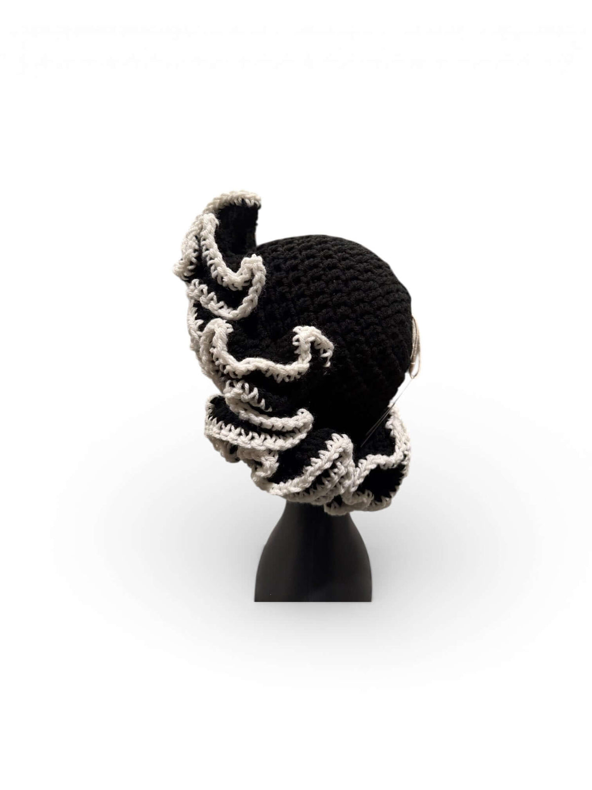 Monochrome Ruffle Crown-Signature Texture Crown showcasing layered ruffle detailing in black and white.