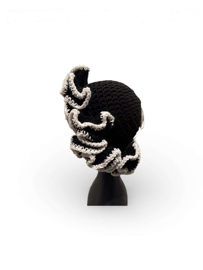 Monochrome Ruffle Crown-Signature Texture Crown showcasing layered ruffle detailing in black and white.