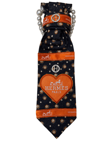 Legacy Luxe Designer-Inspired Tie – Heart of Paris Edition with navy and orange accents, featuring pearl detail.