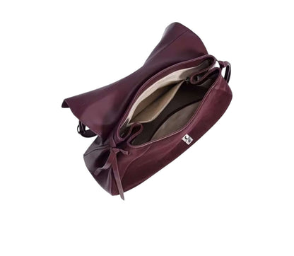 Merlot Suede Elegance Bag open showing spacious interior and luxurious suede design.