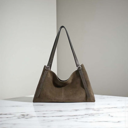 Autumn Luxe Crossbody – Suede & Leather Fall Handbag | Legacy Dealz displayed on a marble surface.