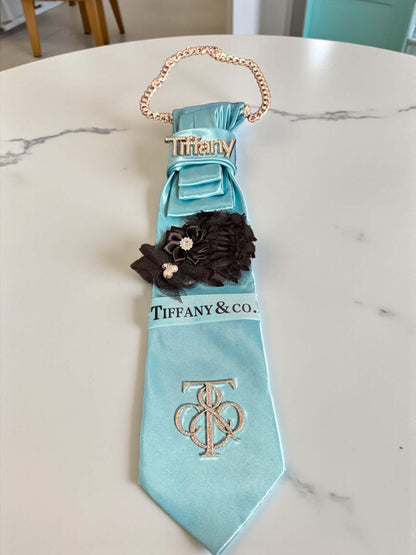 Blue Luxe Signature Tie – Handcrafted Satin Couture Accessory | Legacy Dealz displayed on a marble surface.