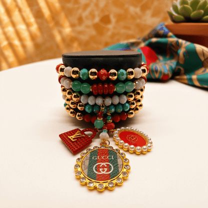 Legacy Enchanted Gem Duo Set featuring handcrafted bracelet with colorful beadwork and boutique handbag charms.