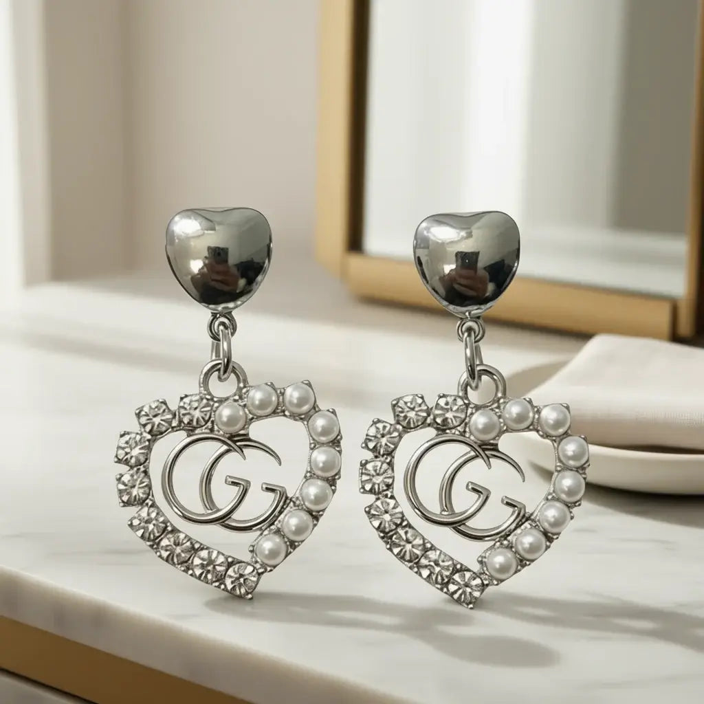 Silver Legacy Heart Pearl Earrings (Upcycled | One-of-One Statement Pair) with silver heart and pearls.