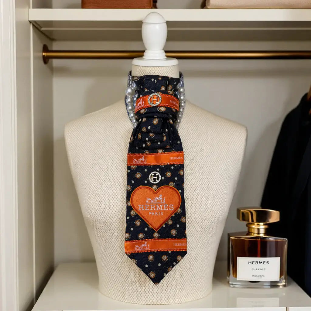 Legacy Luxe Designer-Inspired Tie – Heart of Paris Edition showcased on a mannequin against an elegant backdrop.