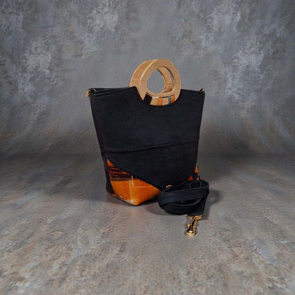 Dana Denim Artisan Handbag – Custom Handcrafted Denim & Wood Handle Bag with detachable strap on textured background.