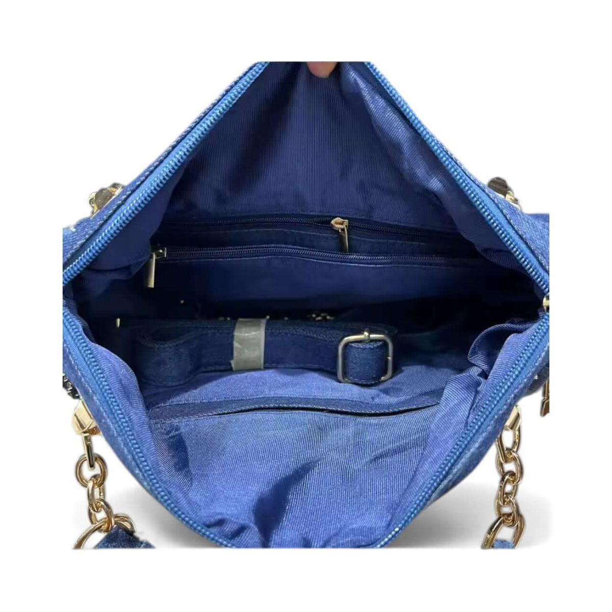 Inside view of the Midnight Chic Crystal Tote – Luxury Embellished Denim Bag showcasing spacious compartments and lining.