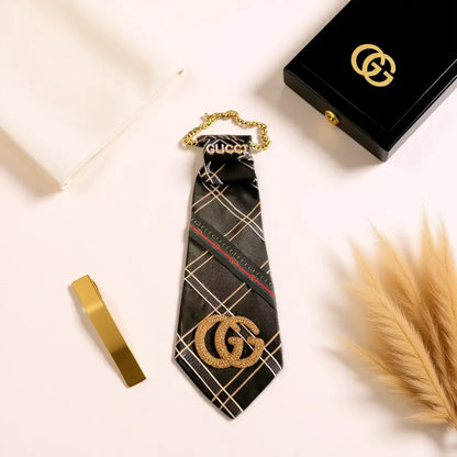 The Luxe Power Tie | Custom Designer Tie by Legacy Dealz displayed with gold detailing and luxury aesthetics.