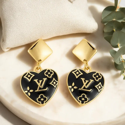 Noir Monogram Heart Drop Earrings (Upcycled • One of One) in black enamel and gold-tone detail.