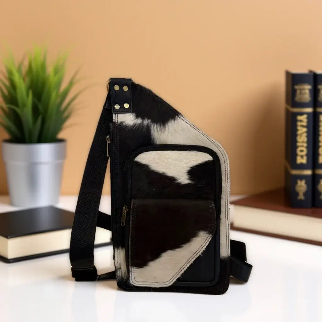Dakota Crossbody Luxe – Custom Designed Cowhide Bag with Multiple Pockets displayed against a minimalistic background.
