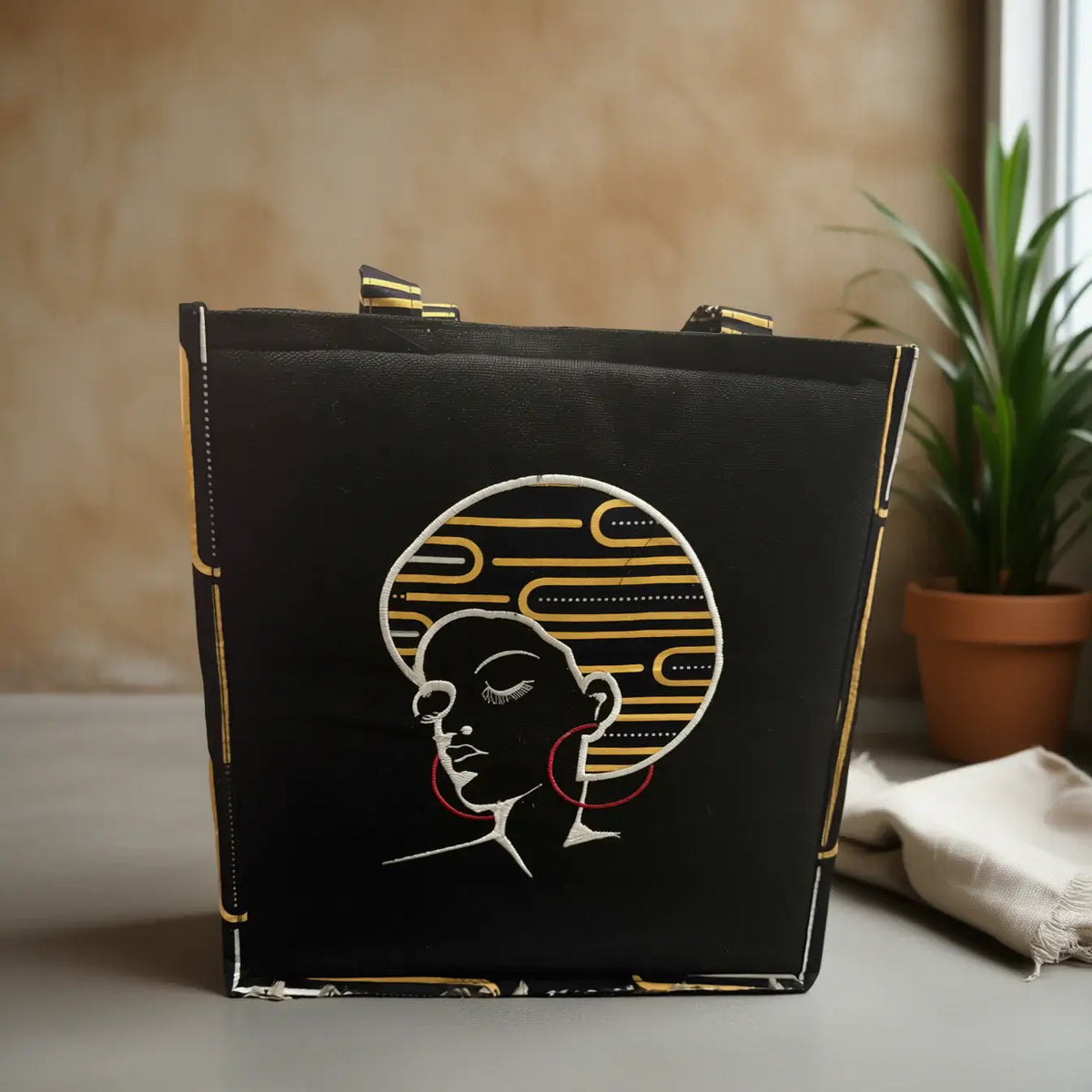 Angela Bag – Waterproof Hand-Stitched Multifunctional Tote | Amani Belle Collection featuring artistic design and vibrant accents.