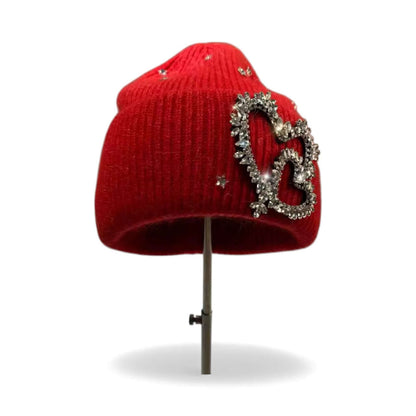 Legacy Luxe “Crimson Heart Spark Beanie” featuring rhinestone heart and stars in vibrant red knit.