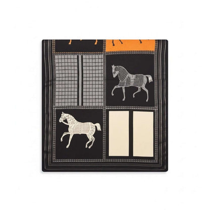 Legacy Luxe Savannah Noir Safari Wrap featuring bold orange accents and elegant horse patterns in a silky lightweight design.