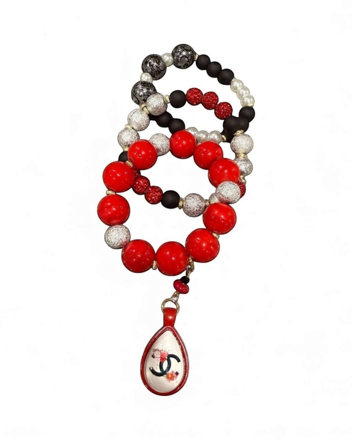 Legacy Dealz red, black, and silver beaded bracelets with a charm featuring a floral CC logo.