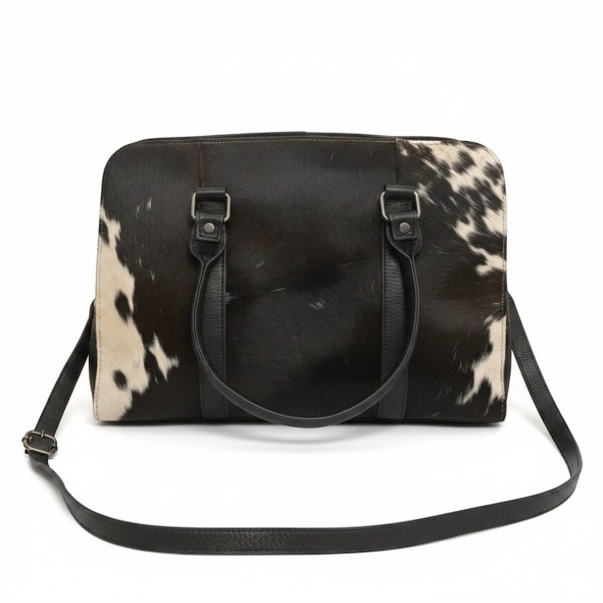 Legacy Dealz Wyatt Bow Bag: black and white cowhide leather crossbody with top handles and detachable strap.